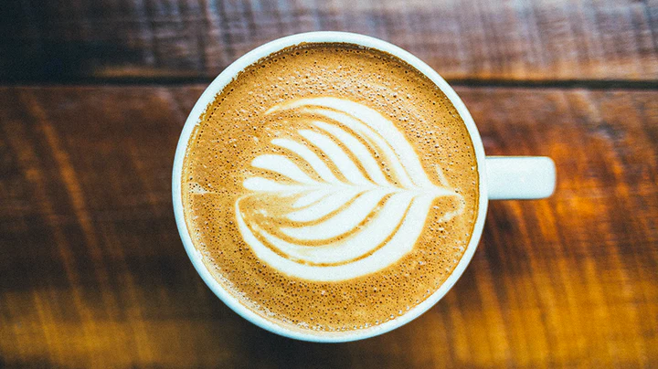 Latte art featuring a beautiful heart design on the creamy surface